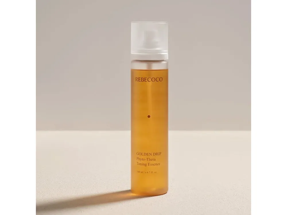Rebecoco Golden Drip Phyto-Thera Toning Essence - rozjasňující toner s Niaciamidem Kup Teď